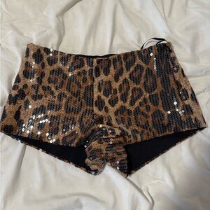 Edikted Leopard Sequin Bike Shorts in Brown and Black